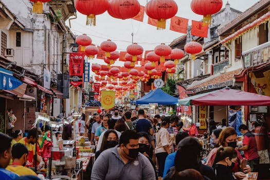 people exploring a flea market while engaging with vendors